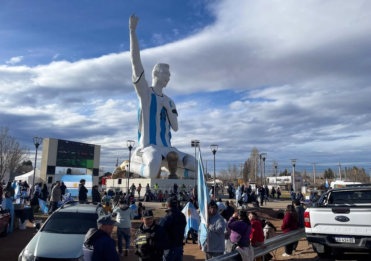 Crowds gather by a statue of Lionel Messi in Argentina as the country celebrates reaching the World Cup final, as taken from [Reuters](https://www.reuters.com/sports/soccer/holders-argentina-beat-england-2-1-set-up-world-cup-final-against-spain-2026-07-15/)
